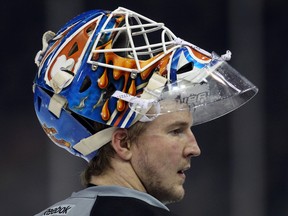 Devan Dubnyk, shown here at an Oilers practice in 2013, was traded to the Nashville Predators by the Oilers Wednesday. The Oilers got 32-year-old forward Matt Hendricks in the transaction. (Perry Mah, Edmonton Sun)
