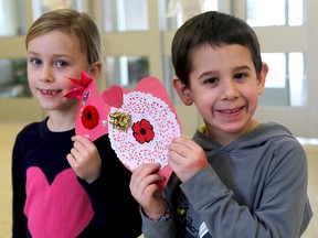 Welborne Avenue Public School students Kaitlyn Pearsall and Brayden Whalen with their Valentine's cards for veterans in Kingston on Wednesday.
IAN MACALPINE/KINGSTON WHIG-STANDARD/QMI AGENCY