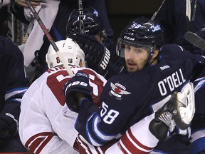 Eric O'Dell could skate with Olli Jokinen and Dustin Byfuglien Thursday night in Calgary.