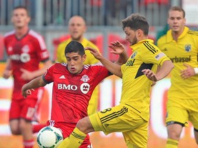 Toronto FC should be looking to trade Designated Player Matias Laba at the draft to make the team roster compliant. (JACK BOLAND/Toronto Sun)