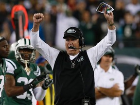 New York Jets head coach Rex Ryan celebrates after a defensive play late in the fourth quarter of the Jets' 27-20 win over the Buffalo Bills during their game in East Rutherford, New Jersey, September 22, 2013. (REUTERS/Mike Segar)