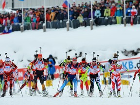 Athletes compete during the women's 4x6km relay during the IBU Biathlon World Cup in Hochfilzen, Austria on December 7, 2013. (AFP PHOTO/SAMUEL KUBANI)