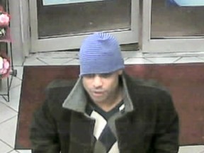 Toronto Police say this man is wanted in the Dec. 21, 2013 robbery of an Esso station at Markham Rd. and Finch Ave. E. (Toronto Police supplied photo)
