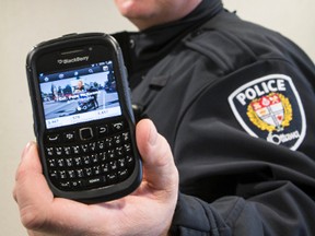 Social media savvy Ottawa Police Constable Pete McKenna will be live tweeting a patrol shift on Saturday starting at 5 p.m. January 16, 2014. Errol McGihon/Ottawa Sun/QMI Agency