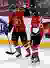 Ottawa Senators' Clarke MacArthur (16) high-fives Erik Karlsson (65)after beating Montreal Canadiens' goalie Carey Price (31) during the first period of NHL action in Ottawa, Ont. on Thursday January 16, 2014. Darren Brown/Ottawa Sun/QMI Agency