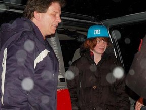 Justin Copan and his father Dan talk with reporters after the teen was rescued from the ice on Lake Simcoe near Barrie, Ont., Thursday, Jan 16, 2014. (MIRIAM KING/QMI Agency)