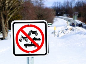 One of the new signs recently installed on the 1000 Islands Parkway trail, this one across from Brown's Bay, clearly shows four motorized vehicles banned for the trail, including snowmobiles (DARCY CHEEK/The Recorder and Times).