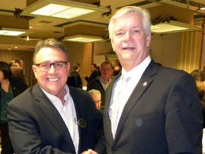Quinte West Chamber of Commerce president Dave Fairfield shakes hands with  John Williams following the mayor's last state-of-the-city address during a chamber luncheon held Jan. 17, 2014.  A crowd of about 150 turned out for the luncheon. 
Ernst Kuglin photo
