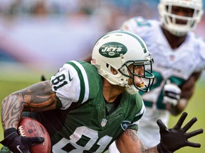 New York Jets tight end Kellen Winslow (81) runs after a catch against the Miami Dolphins during the second half of the game at Sun Life Stadium during the 2013 season. (Brad Barr-USA TODAY Sports)