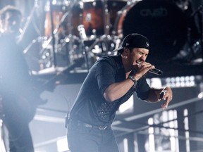 Singer Luke Bryan performs "That's My Kind of Night" at the 47th Country Music Association Awards in Nashville, Tennessee November 6, 2013. (REUTERS/Harrison)