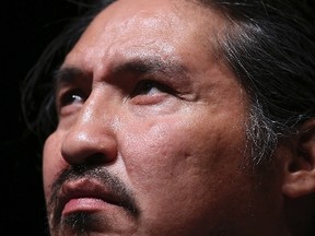 Athabasca Chipewyan First Nation Chief Allan Adam looks on before musician Neil Young's "Honor The Treaties" concert series at the Centennial Concert Hall in Winnipeg, Manitoba, January 16, 2014. (REUTERS/Trevor Hagan)
