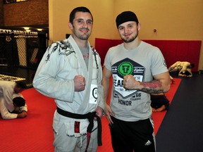 UFC lightweight Jesse Ronson (right) poses with Brazilian Jiu-jitsu black belt and Adrenaline Training Centre coach Rowan Cunningham Jan. 15, 2014. Ronson is preparing for his second UFC bought at Fight Night 36 in Brazil Feb. 15, 2014. CHRIS MONTANINI\LONDONER\QMI AGENCY