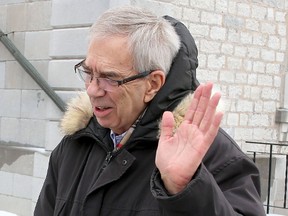 Former Catholic priest Rene Paul Emile Labelle leaves court in Kingston on Friday Jan. 17, after being convicted of sexually assaulting a teenage boy 10 years ago.  
IAN MACALPINE/KINGSTON WHIG-STANDARD/QMI AGENCY