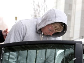 Mackenzie McDonald, 25, leaves court in custody in Kingston after being sentenced Friday for aggravated assault from an incident in 2008.
IAN MACALPINE/KINGSTON WHIG-STANDARD/QMI AGENCY