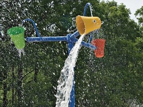 A doggie splash pad proposal has yet to move forward, much to the consternation of a local dog club. (Winnipeg Sun photo illustration)