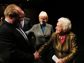 Toronto Mayor Rob Ford and Mississauga Mayor Hazel McCallion shake hands at a meeting of GTA mayors seeking federal and provincial help to pay for ice storm damage. (Stan Behal/Toronto Sun)