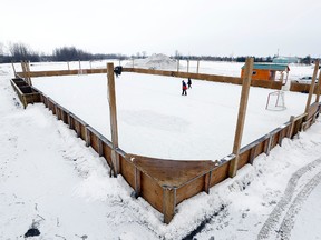 Kids play on an outdoor hockey rink at Creekside Gardens in Richmond, Ont. on Friday January 17, 2014. The town is making a pitch for Kraft Hockeyville.  
Darren Brown/Ottawa Sun/QMI Agency