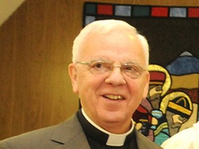 File photo
On Thursday, Father James Hutton (pictured)  of St. Patrick's Church and David Freeman of the Christian and Missionary Alliance in Canada will discuss the Catholic-Evangelical Dialogue at the Marguerite Lougheed Community Centre.