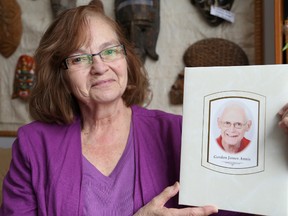 Gino Donato/The Sudbury Star
Karen Annis, with a photo of her late husband, Gordon. Gordon had battled Alzheimer's for a decade when he died in 2012.