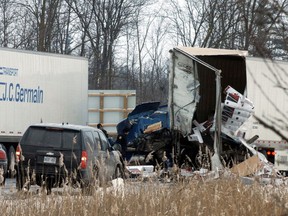 Emergency workers responded to a collision involving three transport trucks on the eastbound lanes of Hwy. 401 near Woodstock Friday morning. (TARA BOWIE, Sentinel-Review)