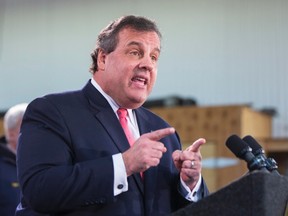New Jersey Governor Chris Christie speaks to media and homeowners about the ongoing recovery from Hurricane Sandy in Manahawkin, New Jersey January 16, 2014.  REUTERS/Lucas Jackson