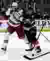 New York Rangers' Rick Nash (61) is hit by Ottawa Senators' Chris Neil (25)during the second period of NHL action in Ottawa, Ont. on Saturday January 18, 2014. Darren Brown/Ottawa Sun/QMI Agency