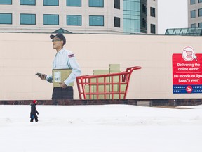 The City of Ottawa has received complaints about the massive mural on the Canada Post building at Riverside Drive and Heron Road shown here on Jan. 15, 2014. 
Errol McGihon/Ottawa Sun/QMI Agency