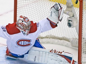 Habs goalie Carey Price can’t get enough of his glove on Mason Raymond’s power-play goal during the second period of Saturday night’s game at the ACC. (JACK BOLAND/Toronto Sun)