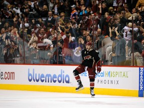 Coyotes defenceman Keith Yandle celebrates after scoring to give his team an overtime victory on Dec. 31 at Jobing.com Arena. Yandle has 22 points in 24 home games this season. (KELVIN KUO/USA TODAY Sports)