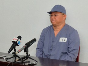 Kenneth Bae, a Korean-American Christian missionary who has been detained in North Korea for more than a year, meets a limited number of media outlets in Pyongyang, in this photo taken by Kyodo January 20, 2014. (REUTERS/Kyodo)