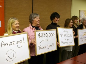 The community fundraising campaign for a new Women's Place shelter said Monday it has raised $830,000 and urged St. Thomas and Elgin to put it over its $1 million goal. From left: Adam McBurney, Diane Brown, Jean Bowden, Liz Brown, Diane Storey, Andrea Quenneville and Carole Watson. (Eric Bunnell, Times-Journal)