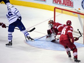 Toronto Maple Leafs defenceman Carl Gunnarsson (36) scores on Phoenix Coyotes goalie Mike Smith at Jobing.com Arena in Phoenix on Monday night. (Matt Kartozian-USA TODAY Sports)