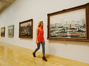A Tate Britain employee in seen in this file photo. REUTERS/LUKE MACGREGOR