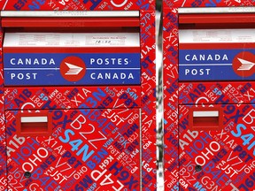 A pair of mailboxes on the property of the Canada Post distribution centre on Wednesday, Dec. 11, 2013 on Rye St. in Peterborugh. Clifford Skarstedt/QMI AGENCY