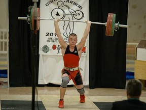 Boady Santavy, 16, lifts 147kg in the clean and jerk at the Junior Canadian Weightlifting Championships Saturday in Scarborough. The Sarnia teen won the national title in the 77kg class and earned his spot on the Canadian national team (Photo submitted by Clance Laylor)