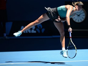 Canada's Eugenie Bouchard serves during her women's singles match against Serbia's Ana Ivanovic at the 2014 Australian Open in Melbourne on Jan. 21. (AFP/Getty)