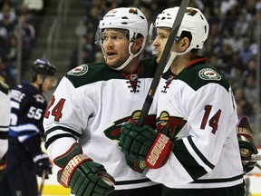 Minnesota Wild winger Matt Cooke responded to speculation regarding a meeting between Ottawa Senators brass and the NHL over last year's skate slice incident with Erik Karlsson. (KEVIN KING/QMI Agency)
