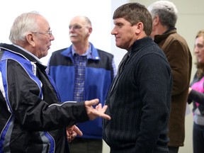 Stirling-Rawdon Mayor Rodney Cooney speaks to a resident following Tuesday's  police services board public meeting. The board was seeking public input regarding the process of hiring a new police chief. 
Emily Mountney/The Intelligencer