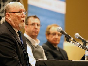 Gino Donato/The Sudbury Star
Bob Segsworth makes a point during the Greater Sudbury Chamber of Commerce open forum on city council structure last night at the United Steelworkers Hall. Looking on are panelists  Mac Bain, a North Bay councillor, and Jim Gordon, former mayor of Sudbury.