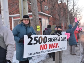 Residents of the Albert and Preston streets area protested Wednesday morning, angry construction of the city's LRT line will involve the re-routing of buses onto Albert and Scott streets. (Chris Hofley/Ottawa Sun)