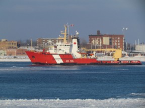 The Canadian Coast Guard ice breaker Samuel Risley heads south on the St. Clair River earlier this week as work by Canadian and U.S. coast guard vessles continues to help shipping movie on the river and Great Lakes. PAUL MORDEN /THE OBSERVER/QMI AGENCY