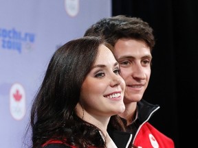 Tessa Virtue and Scott Moir take part in a news conference after being named to Canada's Olympic team at the Canadian Figure Skating Championships in Ottawa January 12, 2014. (REUTERS)