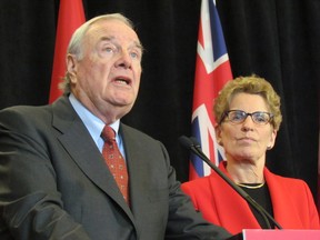 Former prime minister Paul Martin and Ontario Premier Kathleen Wynne on Wednesday, January 22, 2014, at Queen's Park. (Antonella Artuso/Toronto Sun)