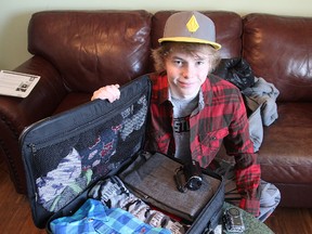 Nat Arney, a Grade 12 student at Ernestown Secondary School, near Kingston, spent Wednesday packing for a trip to Sweden where he will take part in a youth environmental conference. 
MICHAEL LEA\THE WHIG STANDARD\QMI AGENCY