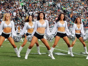 The Raiderettes dance during a timeout between the Philadelphia Eagles and the Oakland Raiders in the first half on Nov. 3, 2013 in Oakland, Calif. (Brian Bahr/Getty Images/AFP)