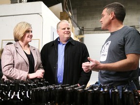 Gino Donato/The Sudbury Star
Andrea Horwath, left, leader of the Ontario NDP, and Joe Cimino, Sudbury riding NDP candidate, chat with Stack Brewery owner Shawn Mailloux while on a tour of the facility on Kelly Lake Road on Wednesday afternoon.
