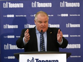 Mayor Rob Ford speaks to media after the executive committees budget meeting at City Hall on Wednesday. (MICHAEL PEAKE/Toronto Sun)