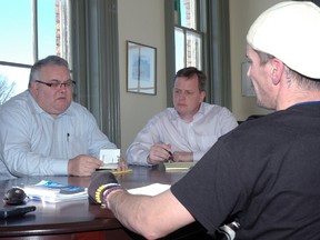 Homeless advocate Jason McComb, right, met with Elgin-Middlesex-London MP Joe Preston, left, and MPP Jeff Yurek on Tuesday to stress the need for a homeless strategy in St. Thomas, ideally based on a program initiated in London five years ago.