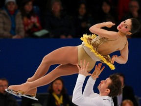 Stefania Berton and Ondrej Hotarek of Italy perform the pairs short program at the European Figure Skating Championships in Budapest, January 17, 2014. (REUTERS/Laszlo Balogh)