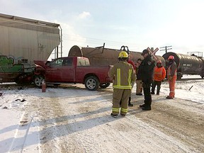 A pickup truck collided with a freight train on Caledonia Rd. just east of Chatham Thursday. DIANA MARTIN / CHATHAM DAILY NEWS / QMI AGENCY